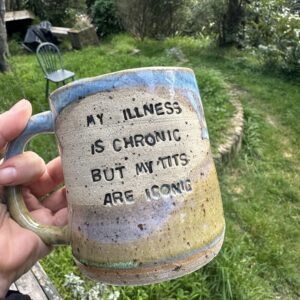 MY ILLNESS IS CHRONIC BUT MY TITS ARE ICONIC mug
