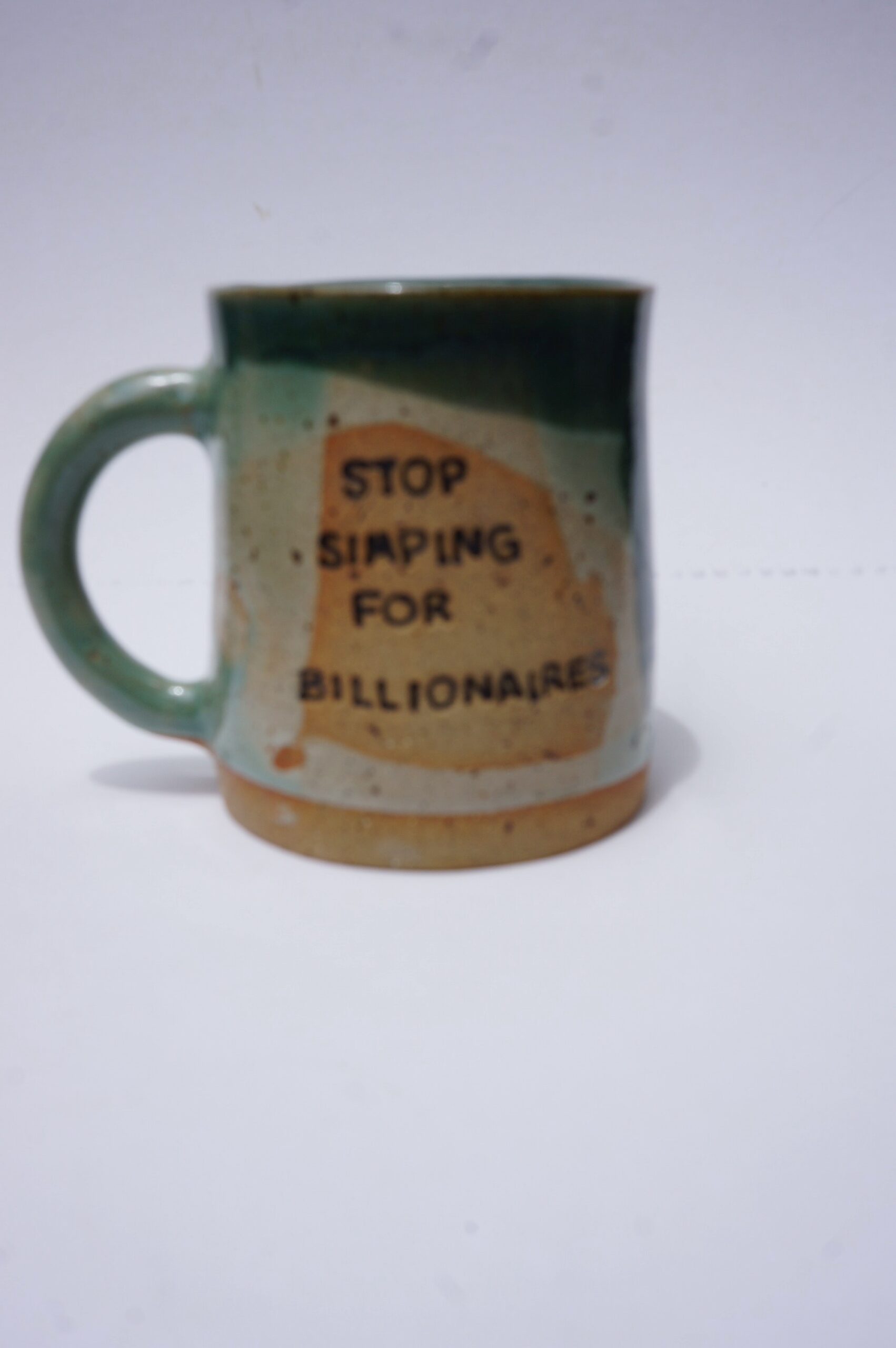 STOP SIMPING FOR BILLIONAIRES green & blue mug