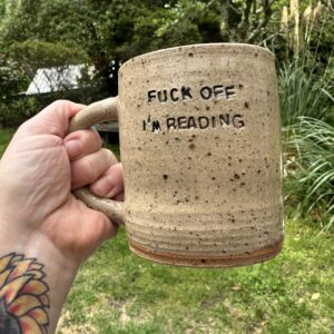 "FUCK OFF I’M READING" mug