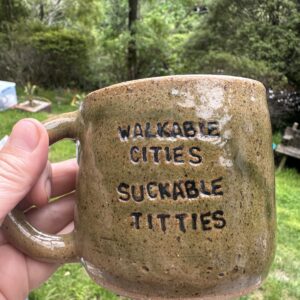 WALKABLE CITIES SUCKABLE TITTIES mug